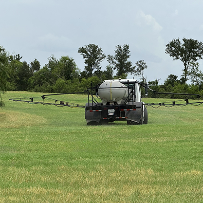Field sprayer applying nutrients and herbicides